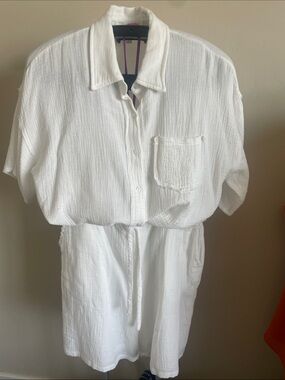 White Women's Button-Front gauze shirt with Drawstring shorts.